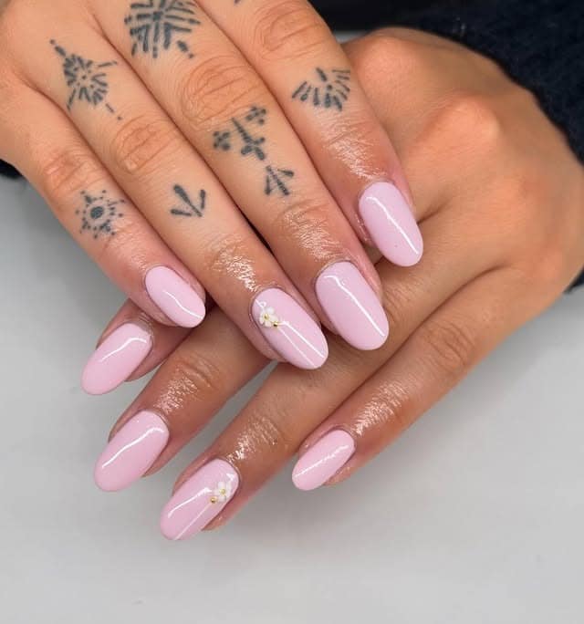 4. Pastel Pink Floral Accent Almond Nails - pastel pink nail ideas
