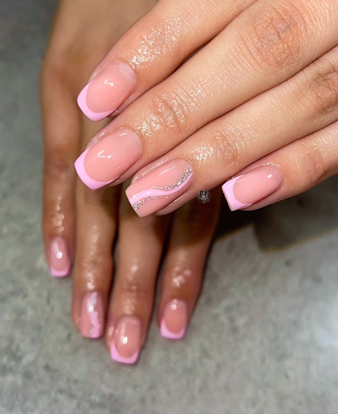 9. Pastel Pink Glitter Accent Almond Nails - pastel pink nail ideas