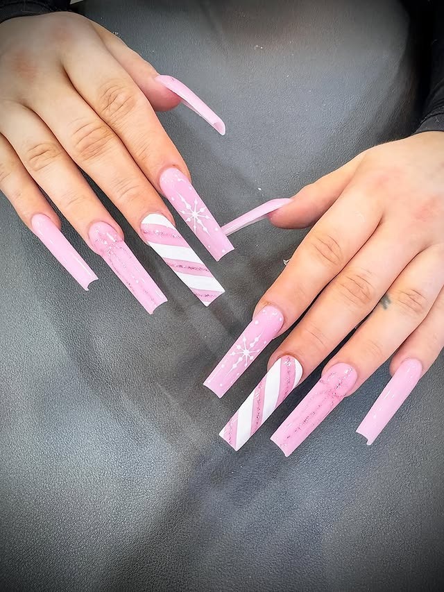 18. Pastel Pink Long Coffin Nails with Graphic Art - pastel pink nail ideas