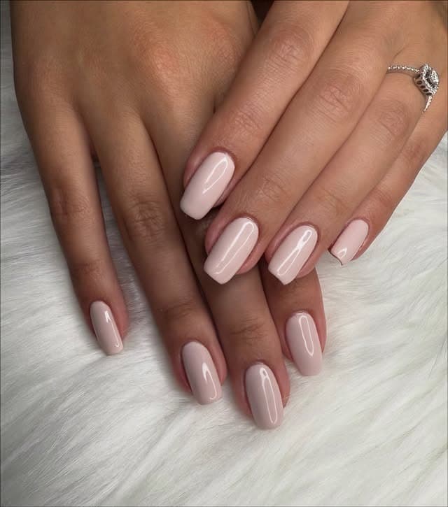 21. Glossy Pastel Pink Almond Gel Nails - pastel pink nail ideas