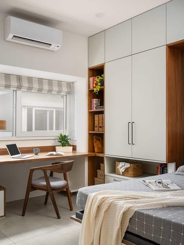 3. Modern Minimal Bedroom Office With Wall-to-Wall Storage - home office bedroom ideas