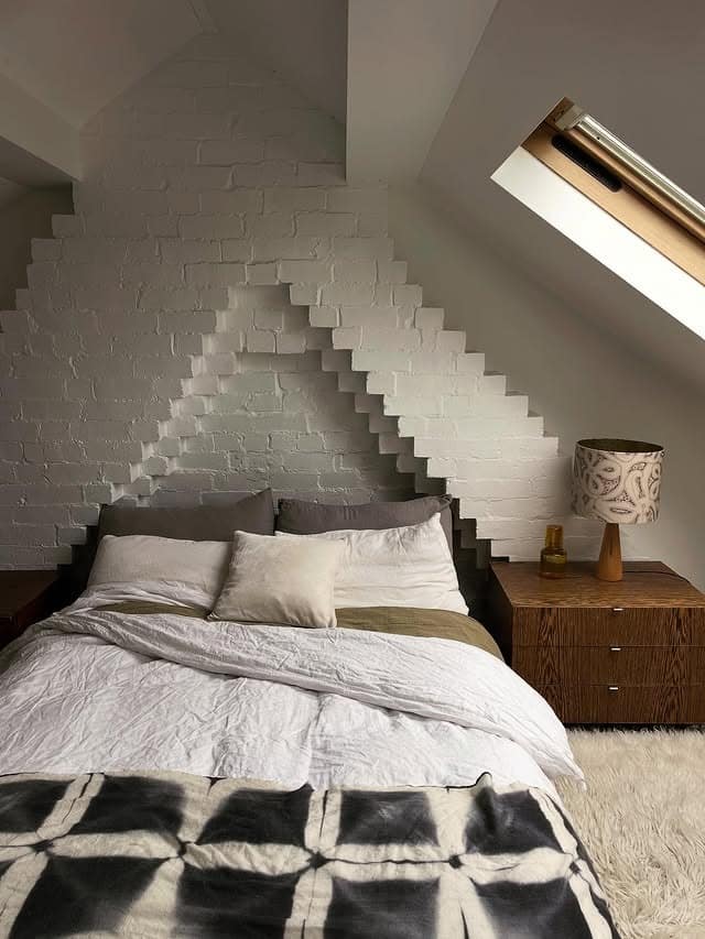 17. Modern Loft Bedroom with Sculptural White Brick Feature Wall - loft bedroom ideas