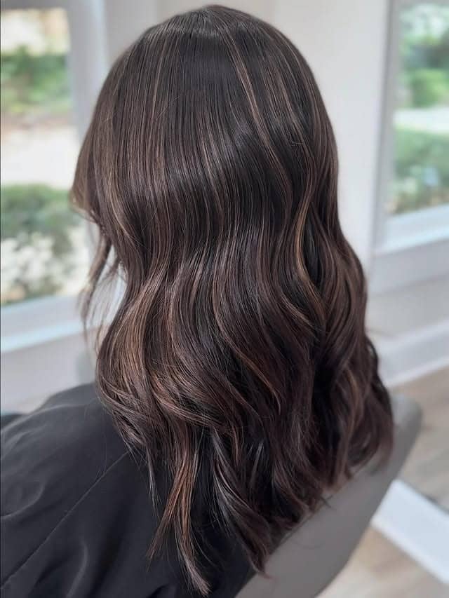 2. Classic Chocolate Brown Loose Waves - Brunette Hair Color