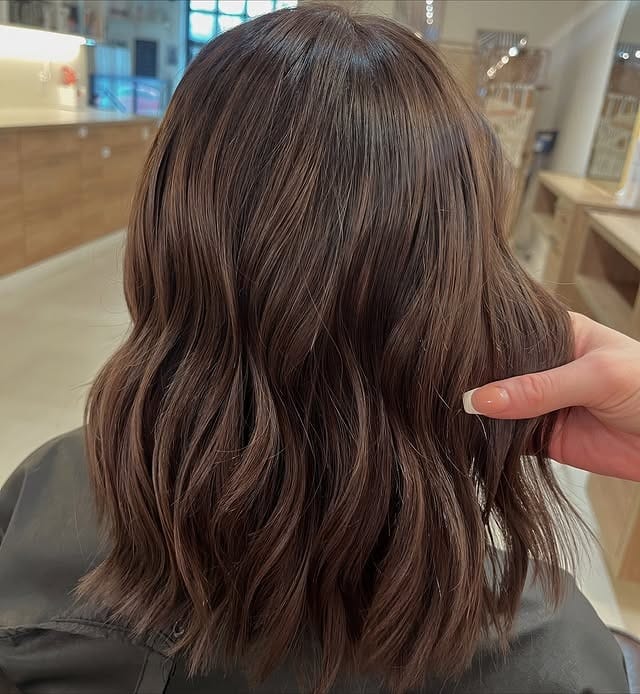 9. Soft Cinnamon Brunette Layered Cut - Brunette Hair Color