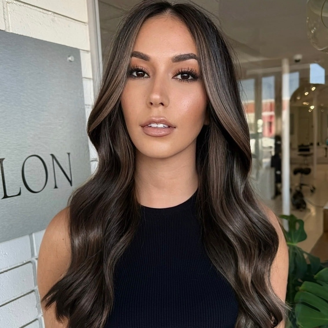 11. Glossy Mocha Brunette Long Waves - Brunette Hair Color