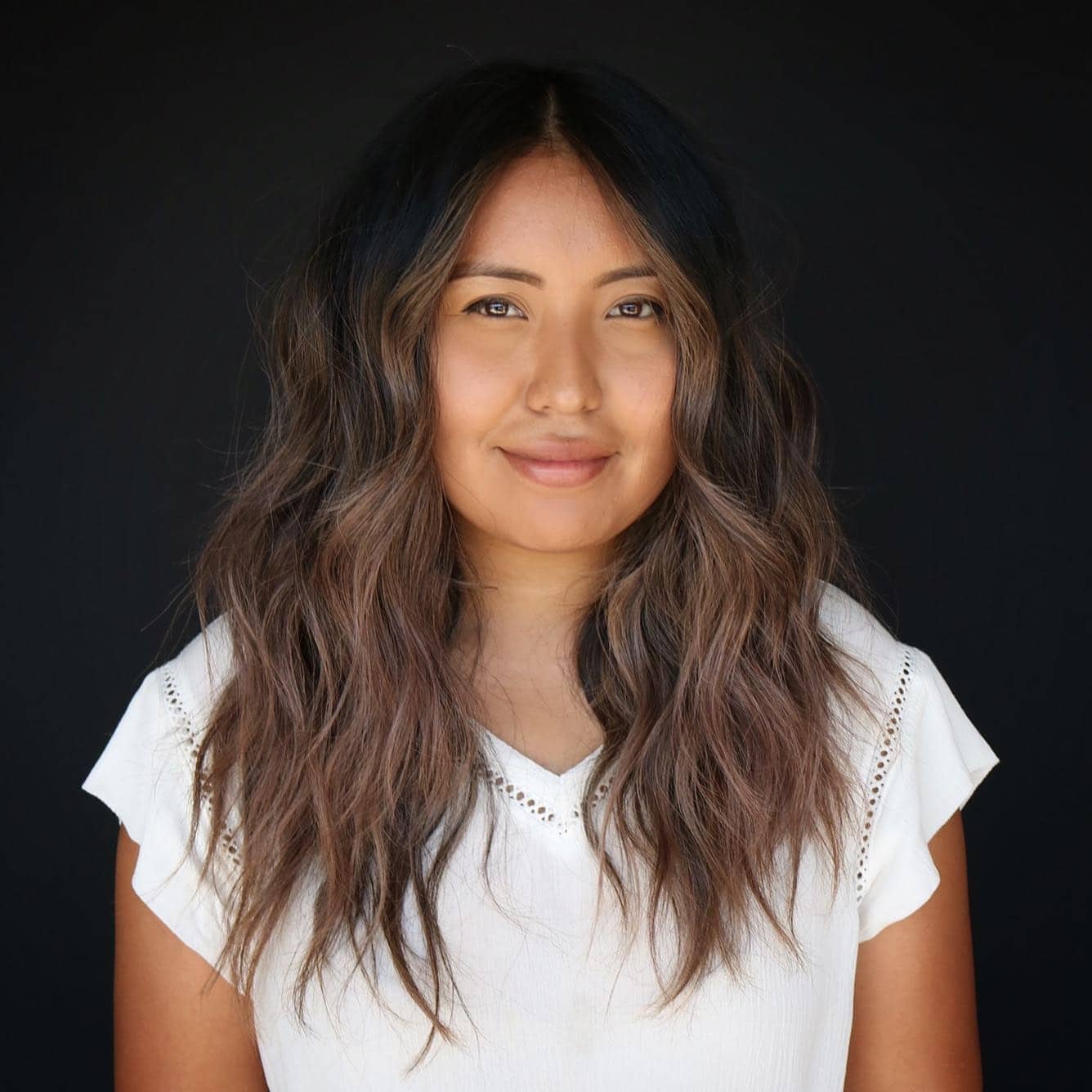 15. Textured Sandy Brunette Waves - Brunette Hair Color