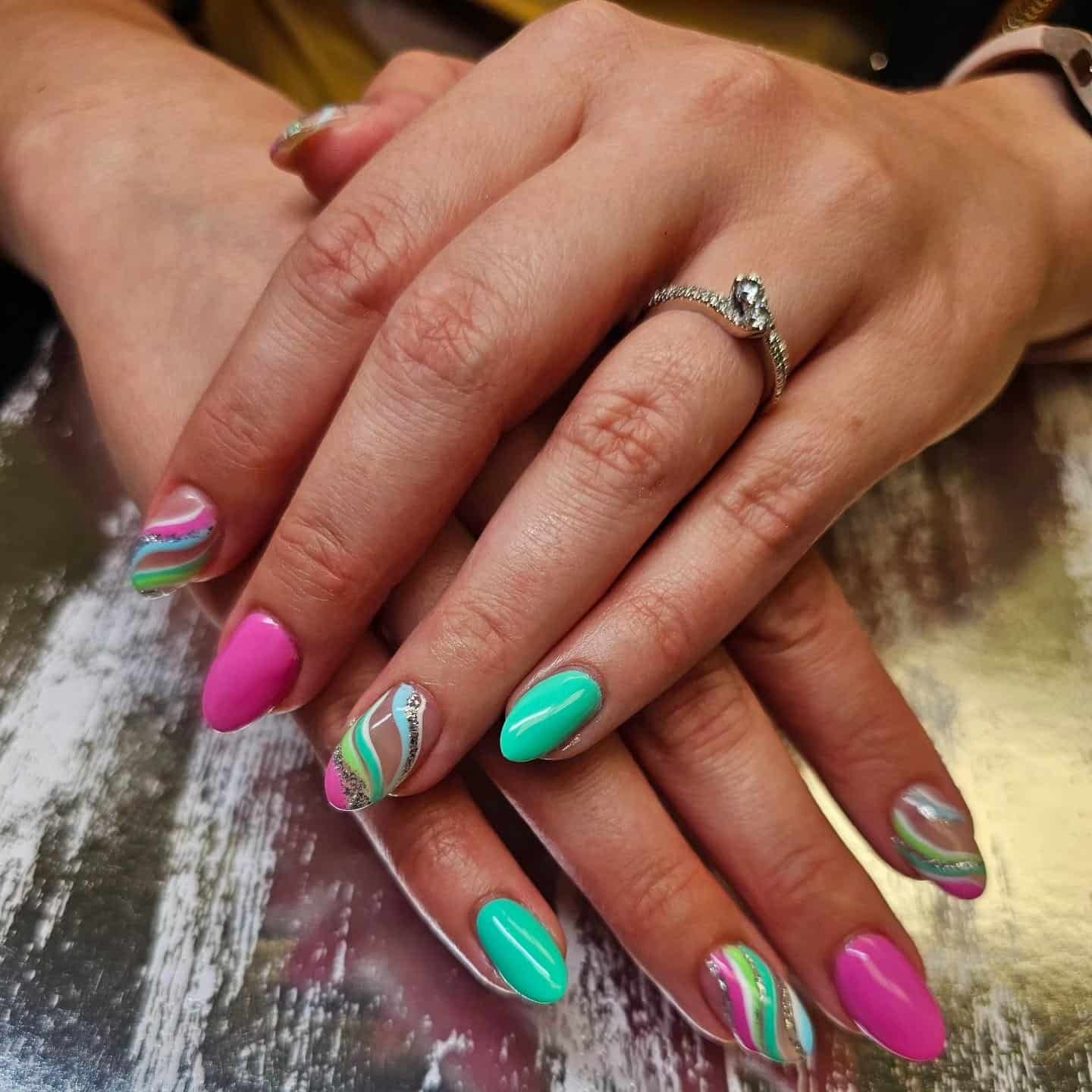 22. Pink and Teal Swirl Almond Nails with Glitter Lines - pink and teal nail ideas