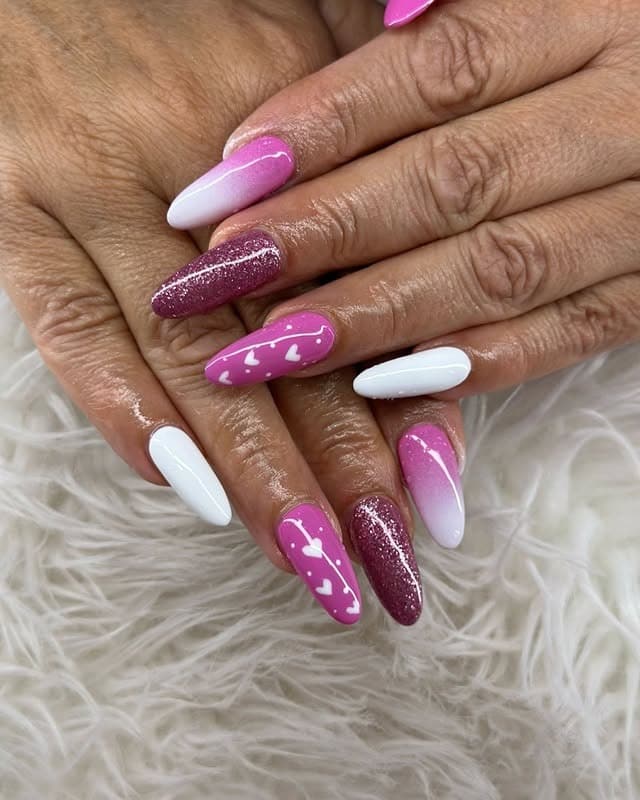 1. Pink Ombre Almond Nails with Glitter and Heart Accents - pink heart nail ideas