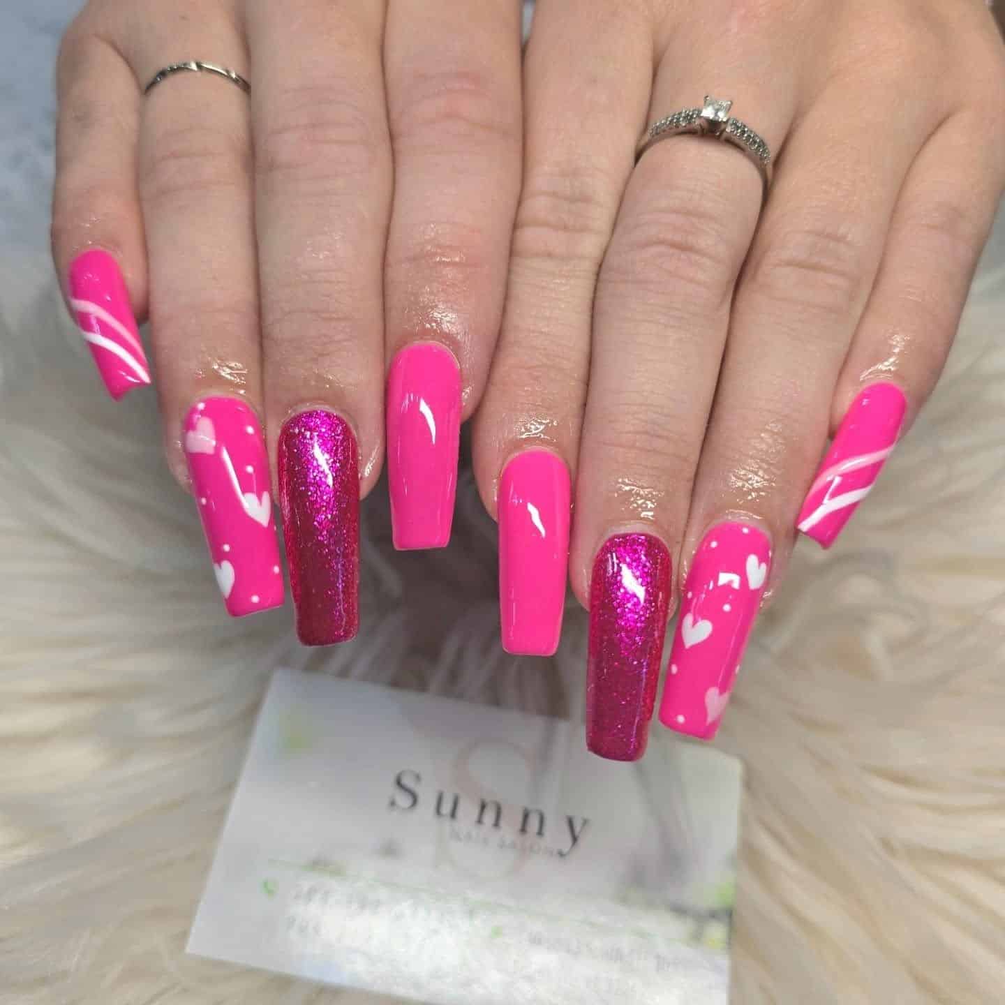 3. Neon Pink Coffin Nails with Glitter Accent and Heart Details - pink heart nail ideas