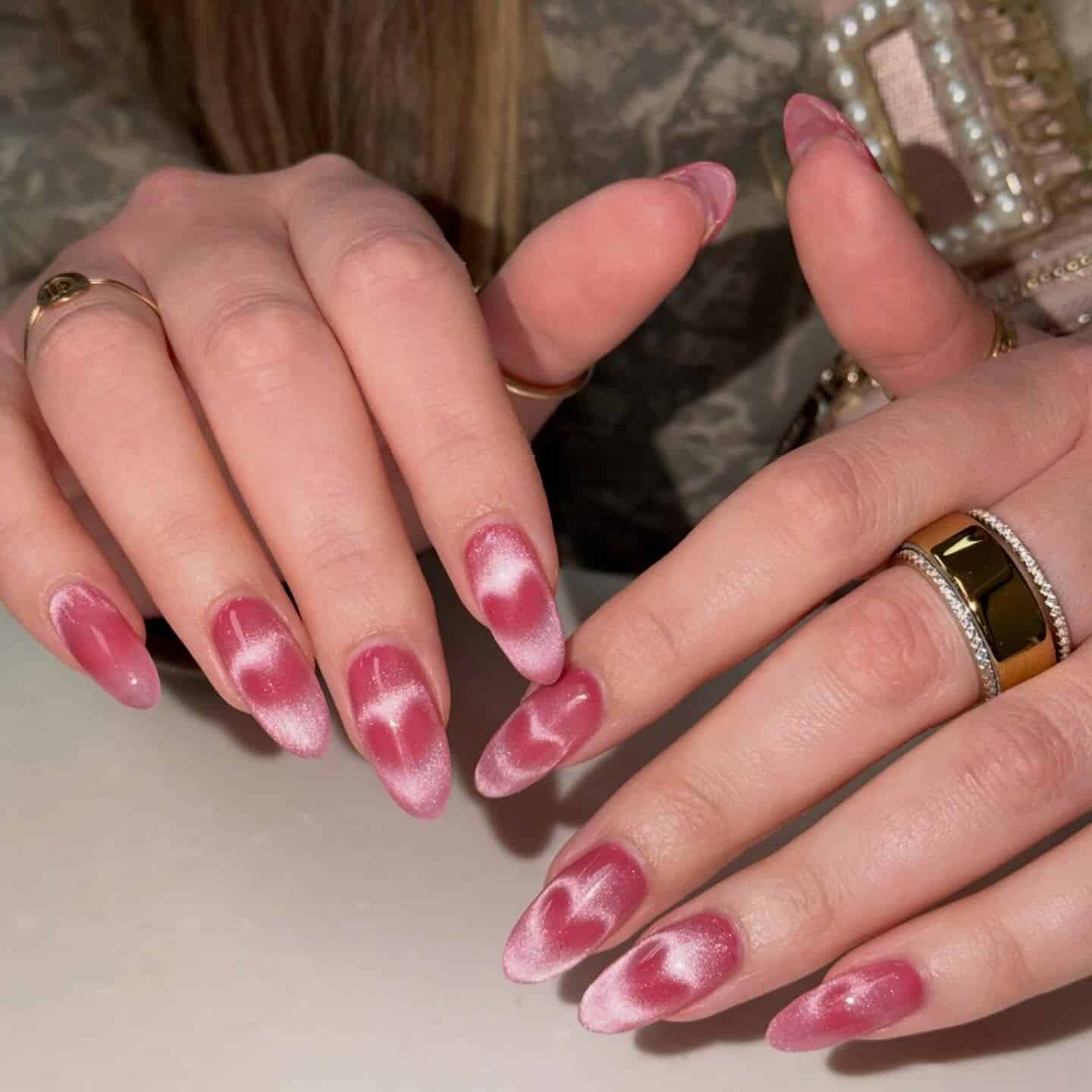 17. Rose Chrome Almond Nails with Soft Heart Glow Effect - pink heart nail ideas