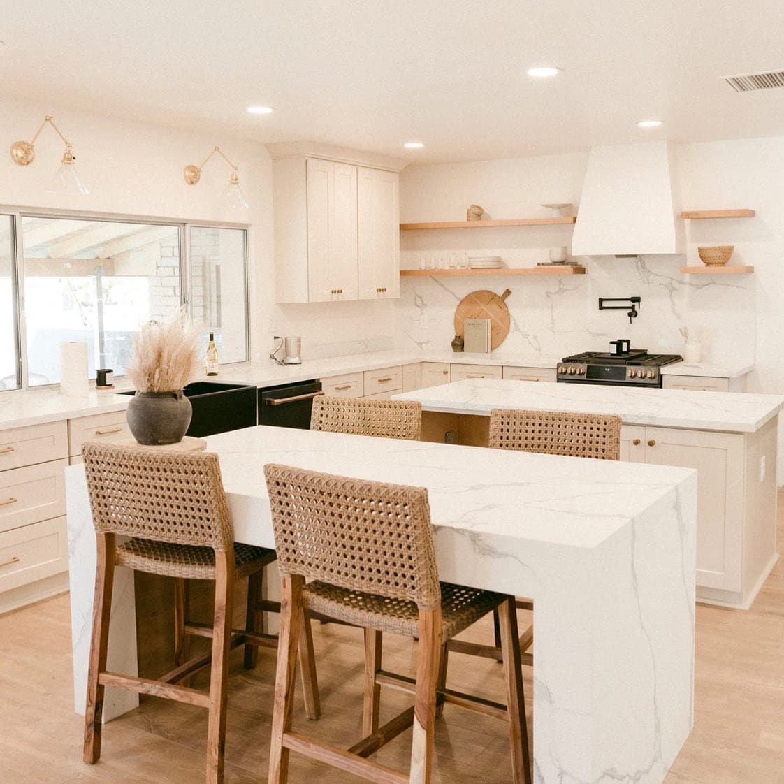 5. Contemporary Cream Kitchen With Waterfall Marble Island - cream kitchen ideas