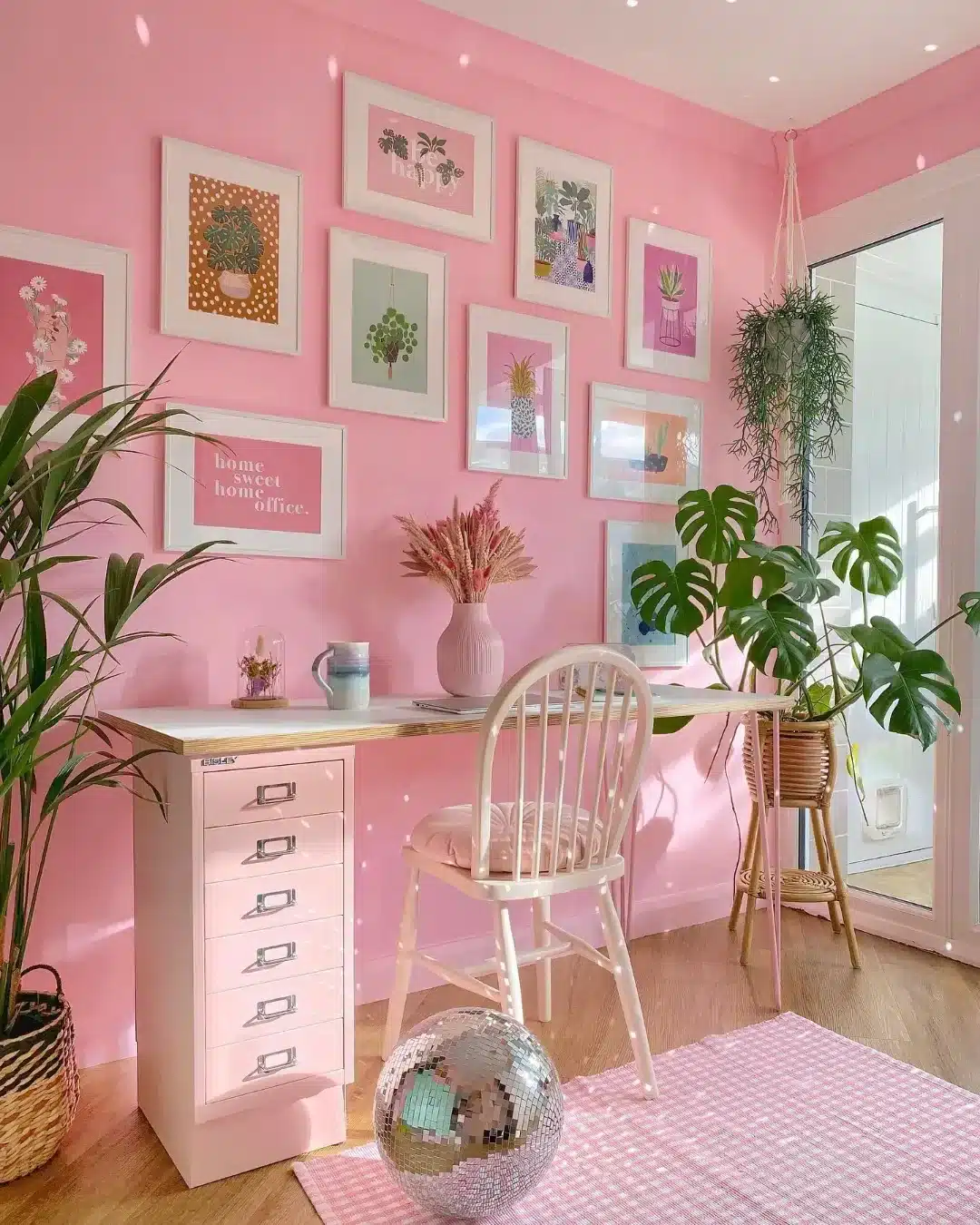 8. Pink Gallery Wall Office with Plants and Compact Storage - small office ideas