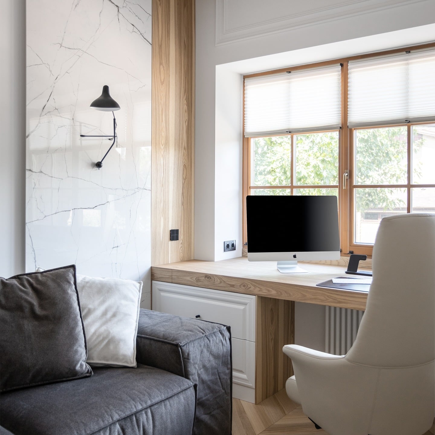 15. Modern Window Desk with Light Wood and Marble Accent Wall - small office ideas