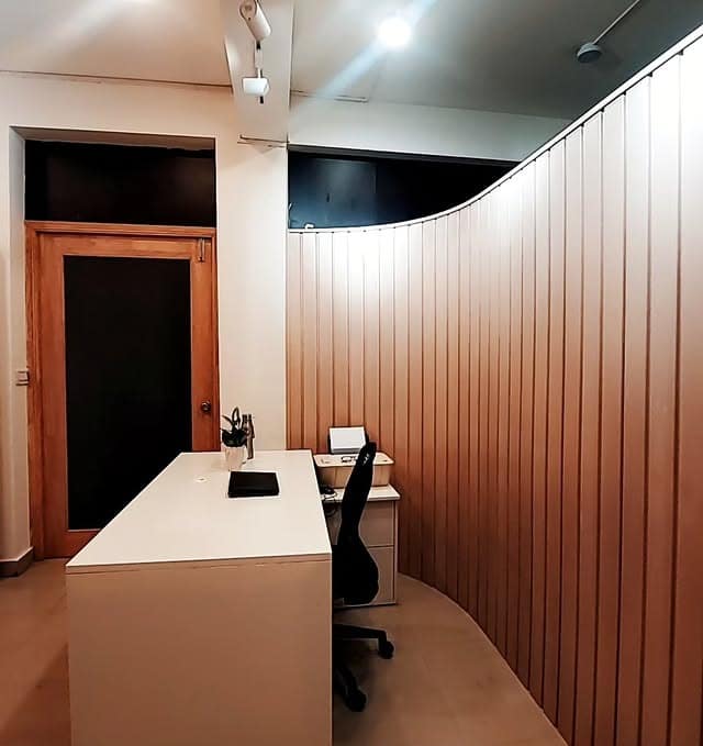 19. Curved Wood Partition Office with Minimal Modern Desk - small office ideas