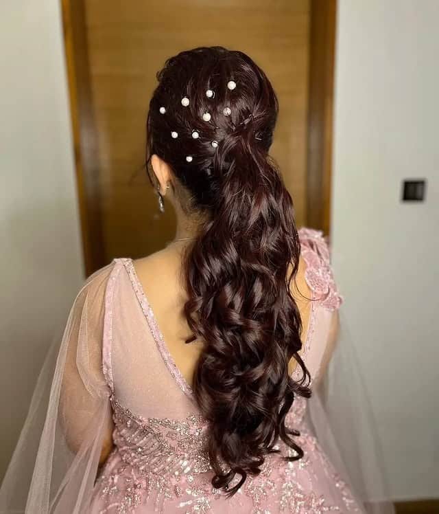 2. Romantic Wavy Ponytail with Deep Mahogany Brown - Ponytail Hairstyles