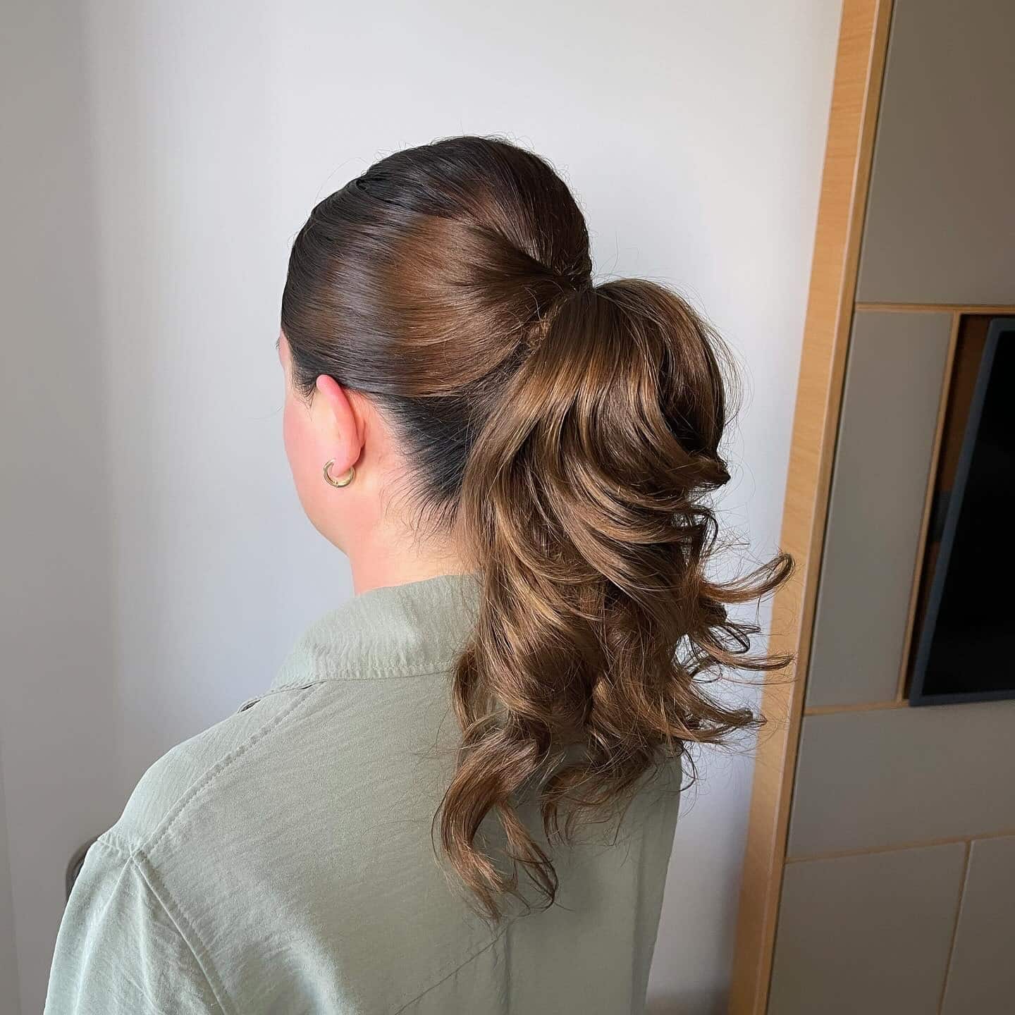 5. Polished High Ponytail with Soft Honey Brown Waves - Ponytail Hairstyles