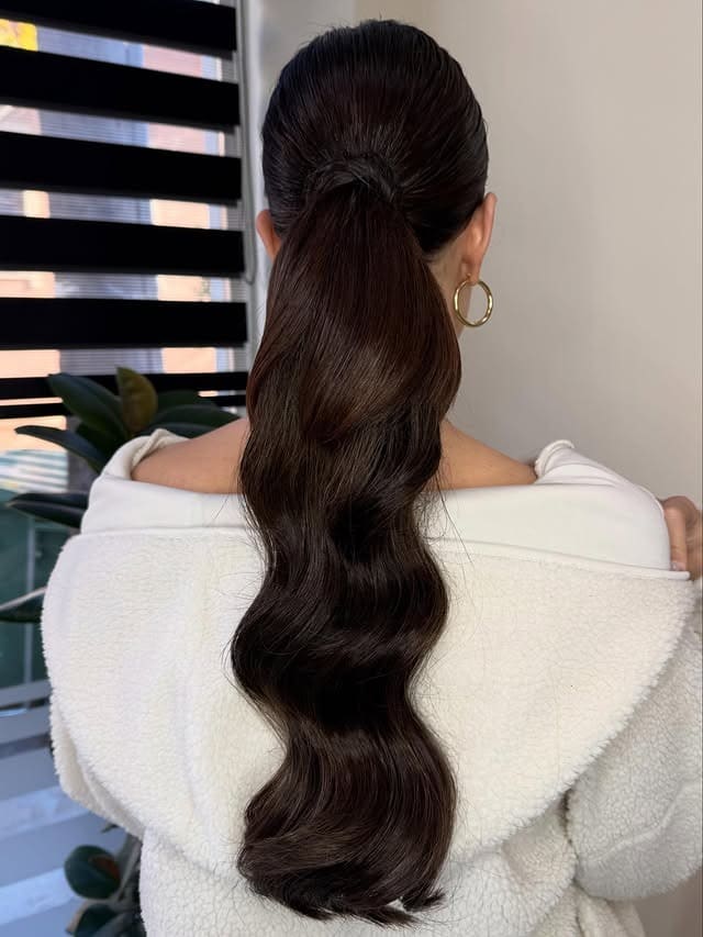 16. Classic Mid Ponytail with Rich Brunette Waves - Ponytail Hairstyles