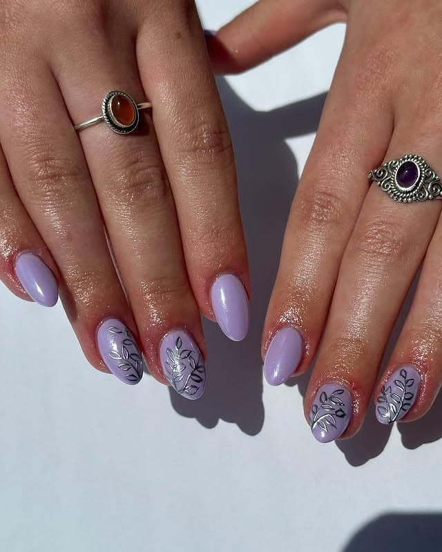 5. Pastel Lavender Nails with Silver Botanical Art - purple and silver nail ideas