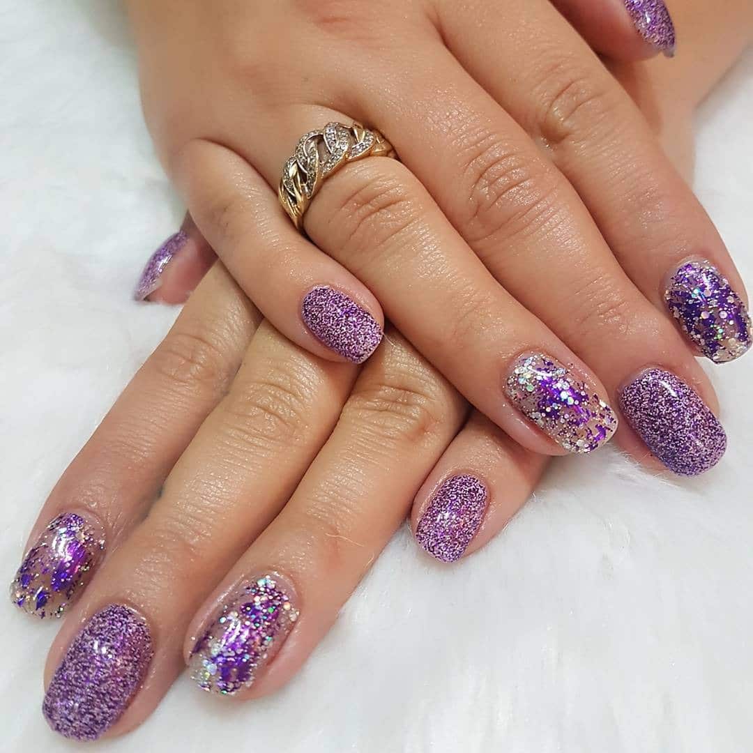 14. Short Lavender Glitter Nails with Purple and Silver Confetti - purple and silver nail ideas
