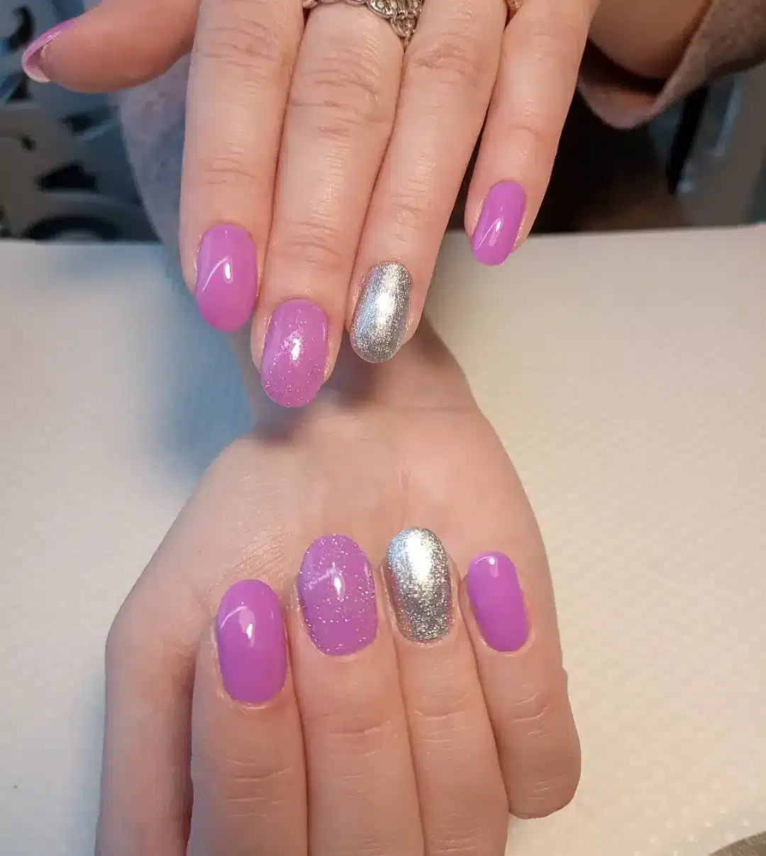 16. Soft Lavender Short Nails with Silver Chrome Accent - purple and silver nail ideas