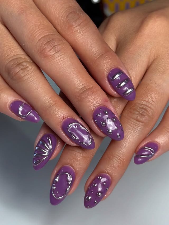 22. Deep Purple Almond Nails with Silver Chrome and Stud Details - purple and silver nail ideas