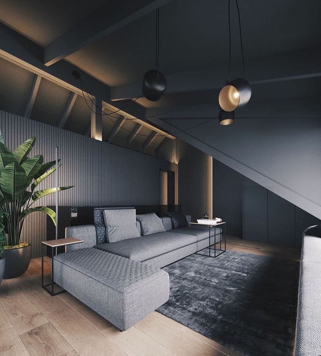 3. Moody Light Gray Living Room with Dramatic Lighting - light gray living room ideas