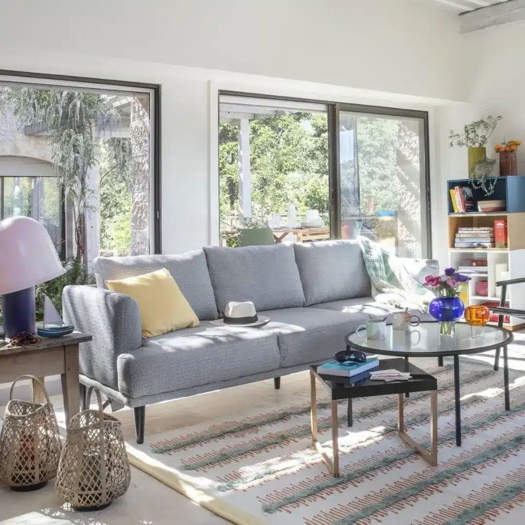 6. Bright Light Gray Living Room with Natural Sunlight - light gray living room ideas