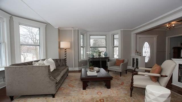 8. Transitional Light Gray Living Room with Warm Neutral Tones - light gray living room ideas