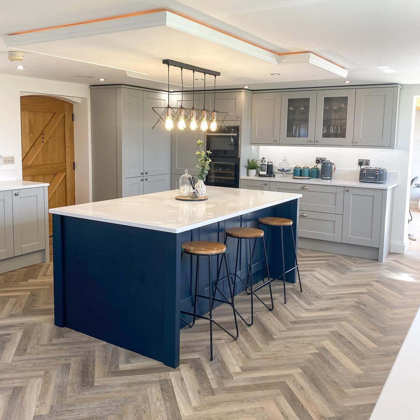 2. Navy Island and Grey Cabinet Kitchen Idea - grey and white kitchen ideas