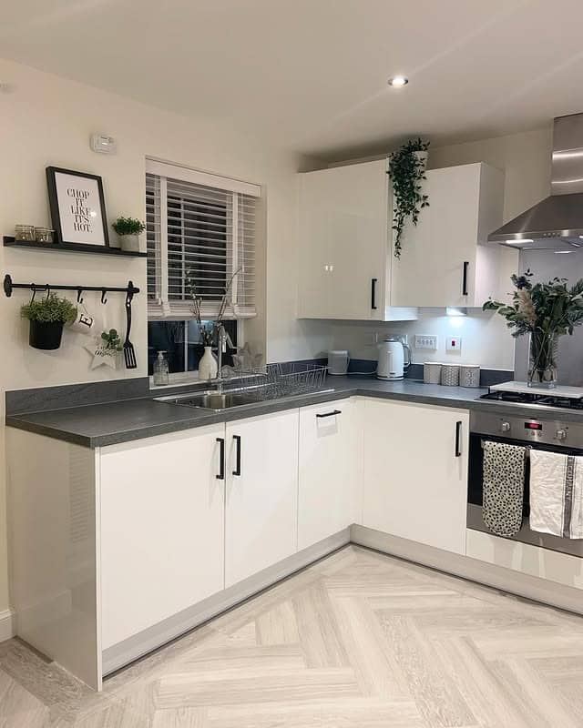 6. White Cabinet Kitchen with Grey Countertop Contrast - grey and white kitchen ideas