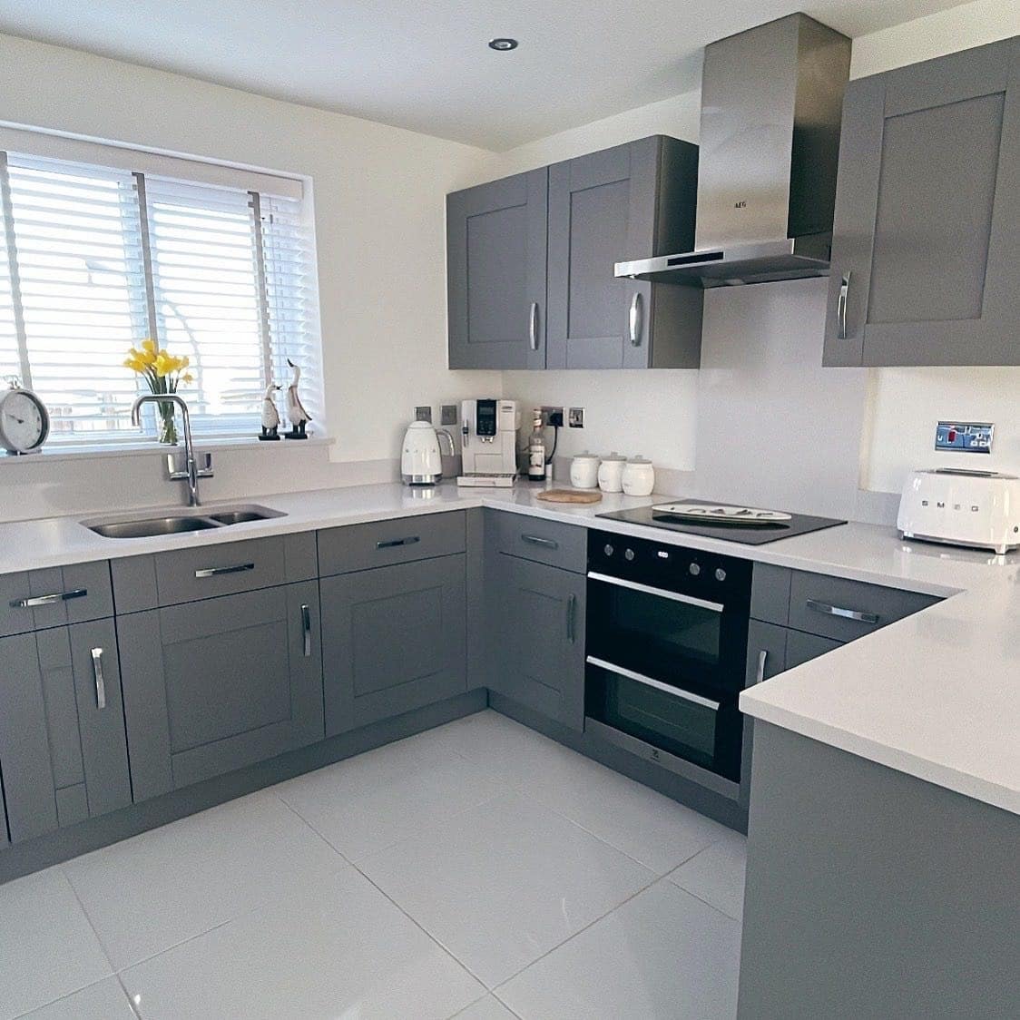 21. Soft Grey Shaker Cabinets with White Countertops Kitchen - grey and white kitchen ideas