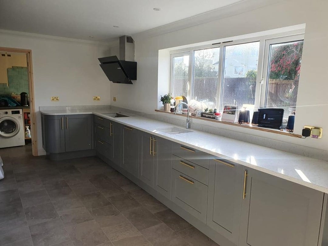 22. Long Grey Cabinet Kitchen with White Worktop Design - grey and white kitchen ideas