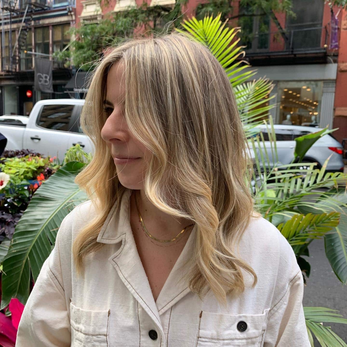 1. Soft Sandy Blonde Waves with Root Melt - Sandy Hair Color