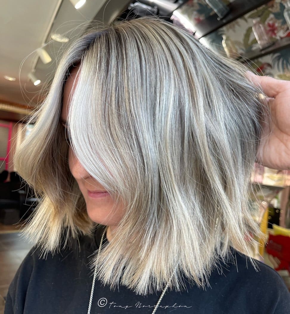 4. Icy Sandy Blonde Textured Lob - Sandy Hair Color