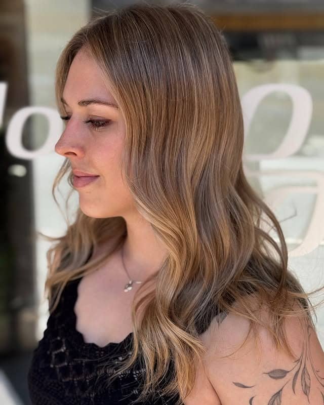 9. Sandy Beige Natural Flow Layers - Sandy Hair Color