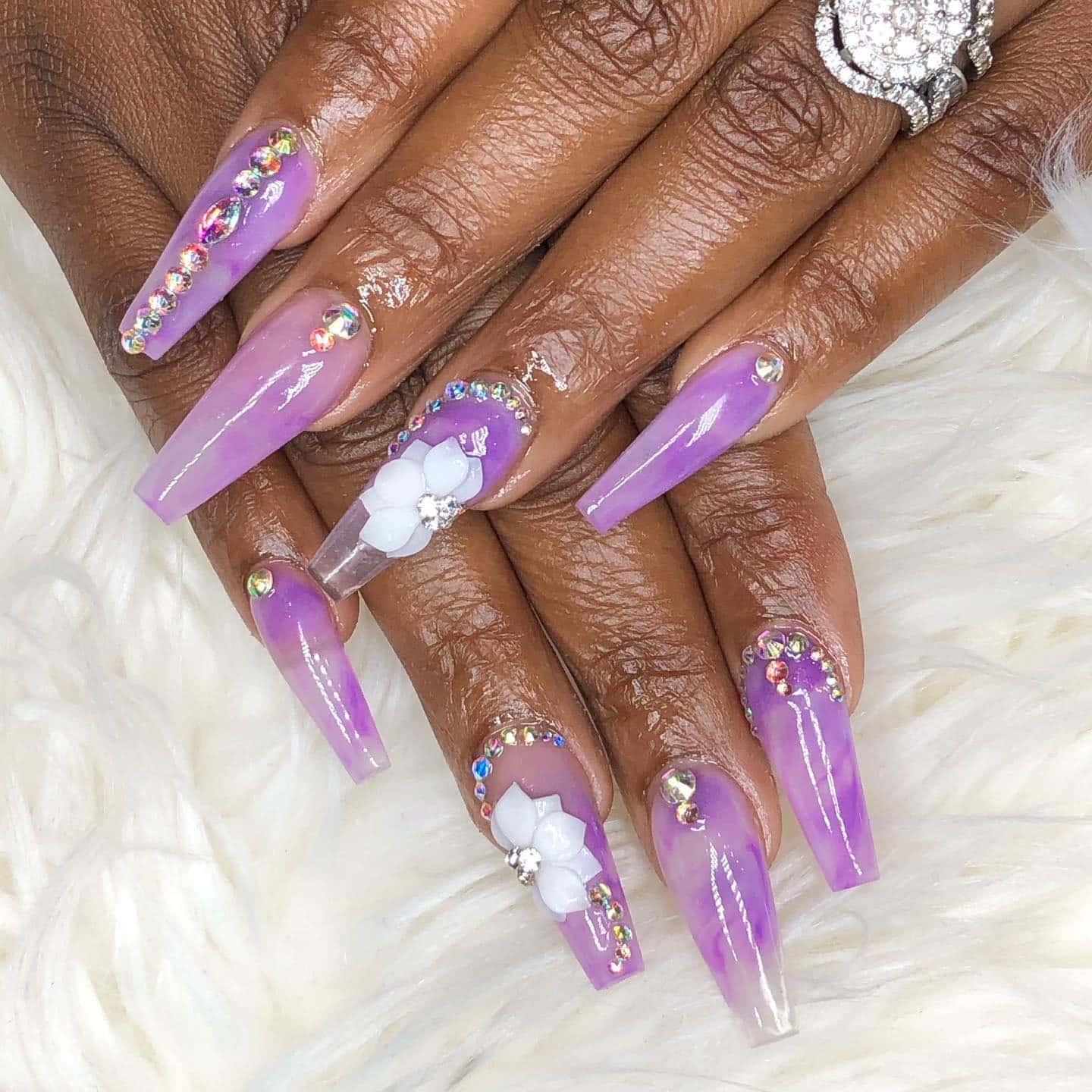 17. Purple Ombre Coffin Nails with Rhinestones and 3D Flower Accent - purple coffin nail ideas