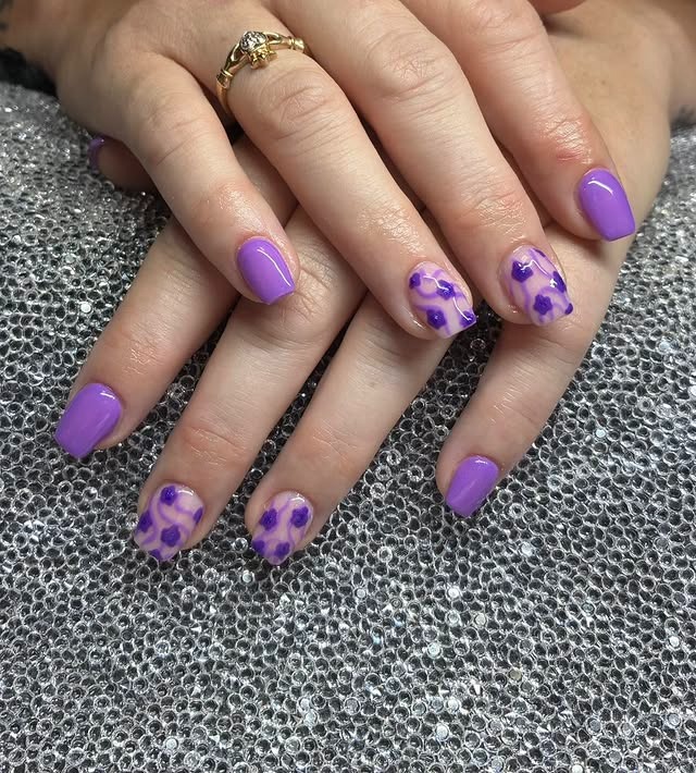 21. Short Lavender Gloss Nails with Purple Floral Accent Art - purple coffin nail ideas