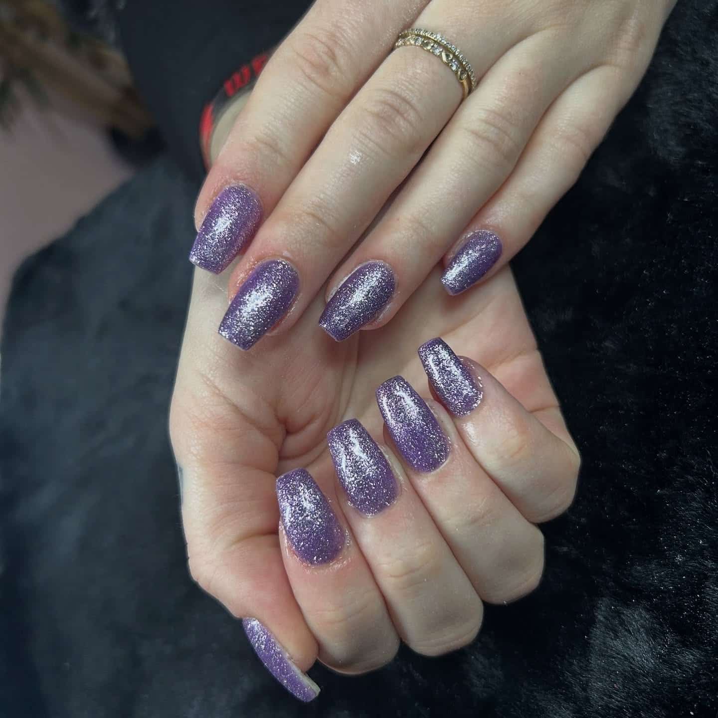 4. Lavender Micro-Glitter Coffin Nails - purple glitter nail ideas