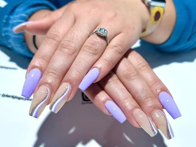 15. Pastel Lavender Coffin Nails with Metallic Wave Design - purple glitter nail ideas