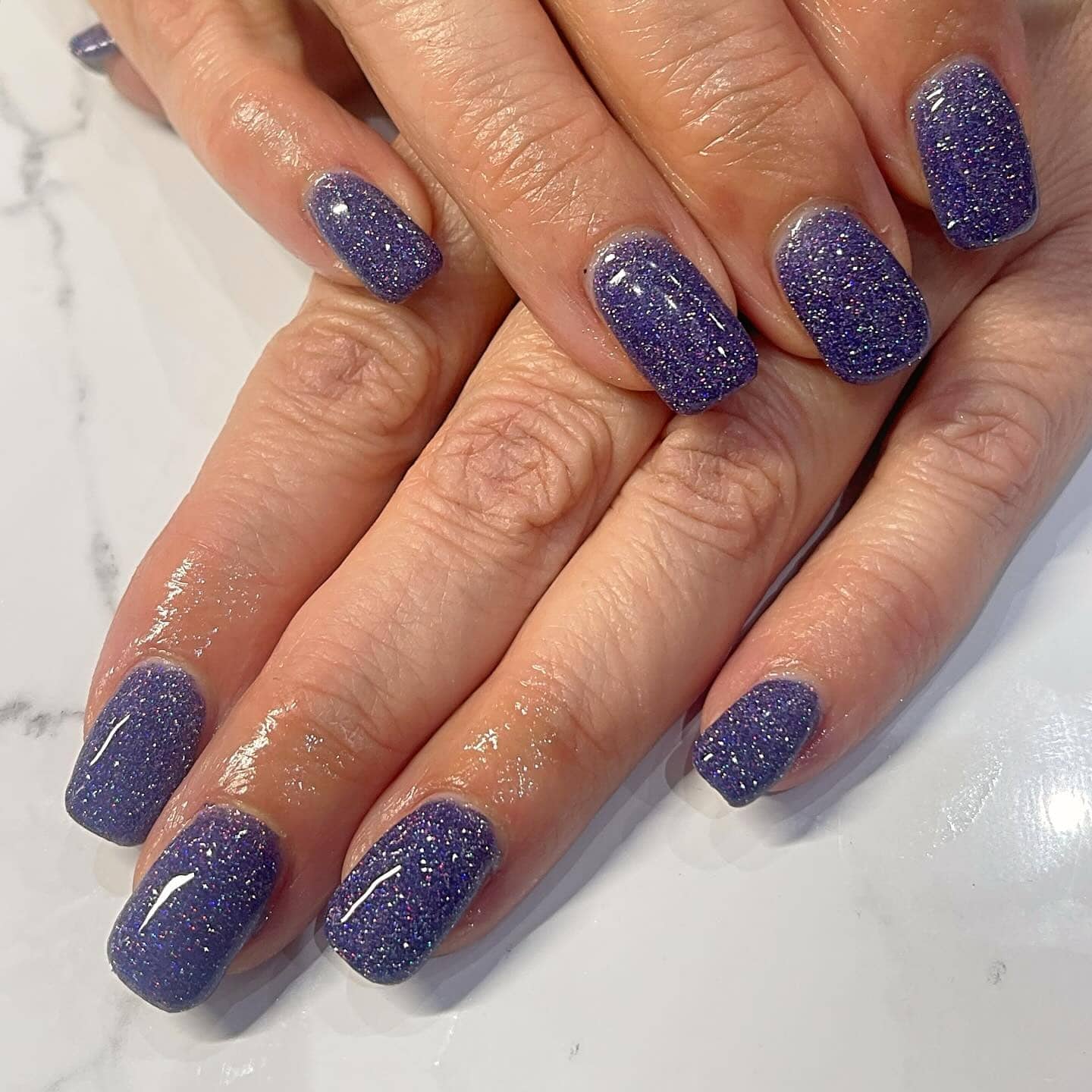 19. Indigo Micro-Glitter Square Nails - purple glitter nail ideas