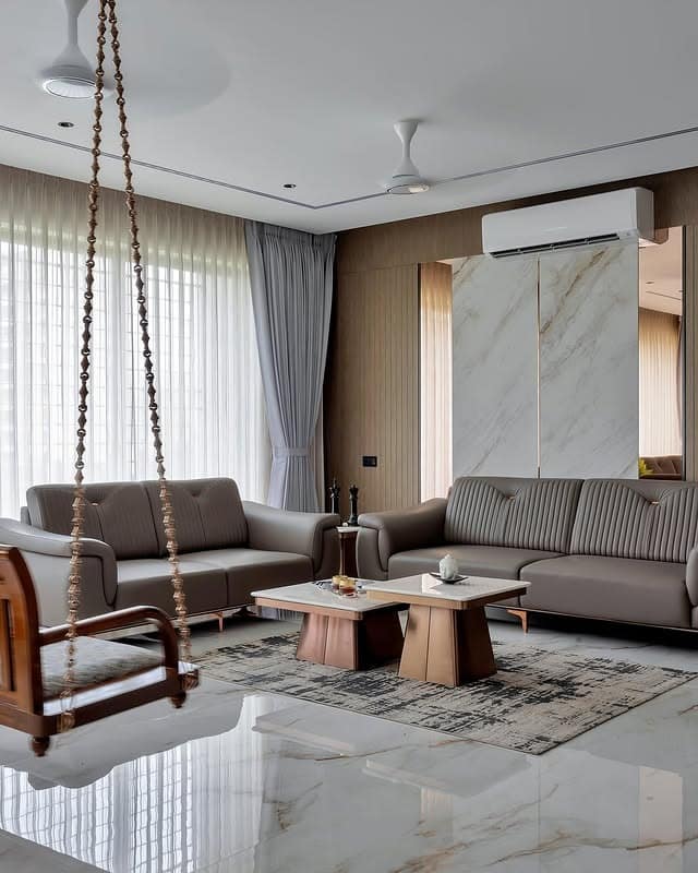 7. Contemporary Indian Minimalist Living Room in Marble White and Warm Wood - minimalist living room ideas