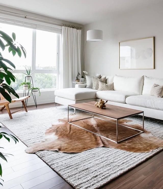 8. Bright Nordic Minimalist Living Room in White and Light Oak - minimalist living room ideas