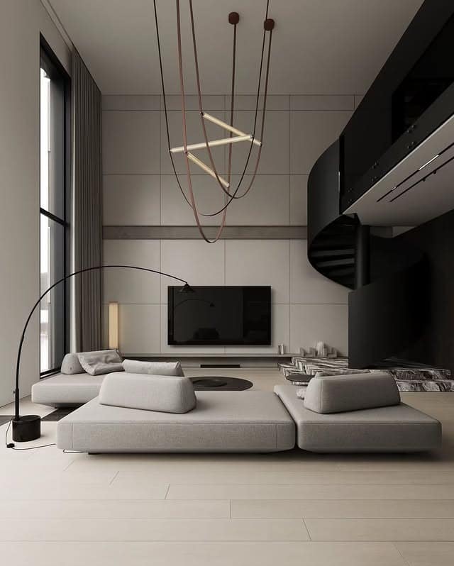 9. Sculptural Modern Minimalist Living Room in Soft Gray and Charcoal - minimalist living room ideas