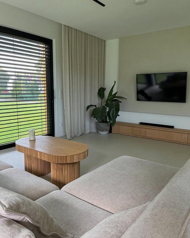 21. Soft Modern Minimalist Living Room in Cream and Light Oak - minimalist living room ideas