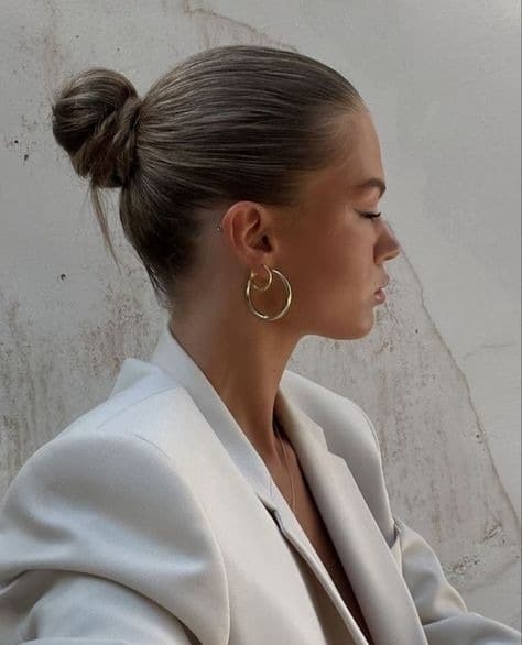 7. Ultra Sleek Micro Bun with Cool Light Brown Tone - Slick Back Hairstyles