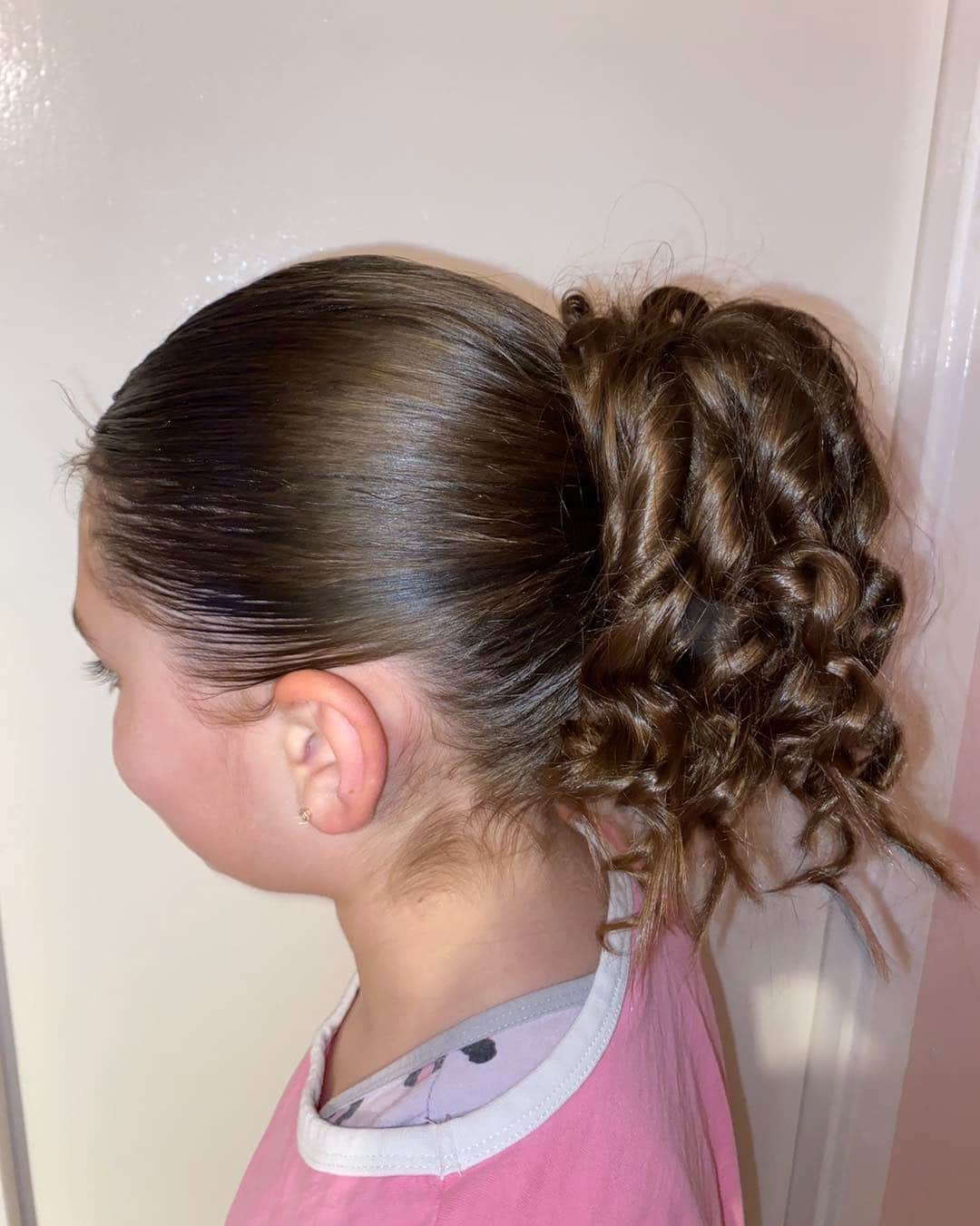 15. Curled Ponytail Updo with Chocolate Brown Shine - Slick Back Hairstyles