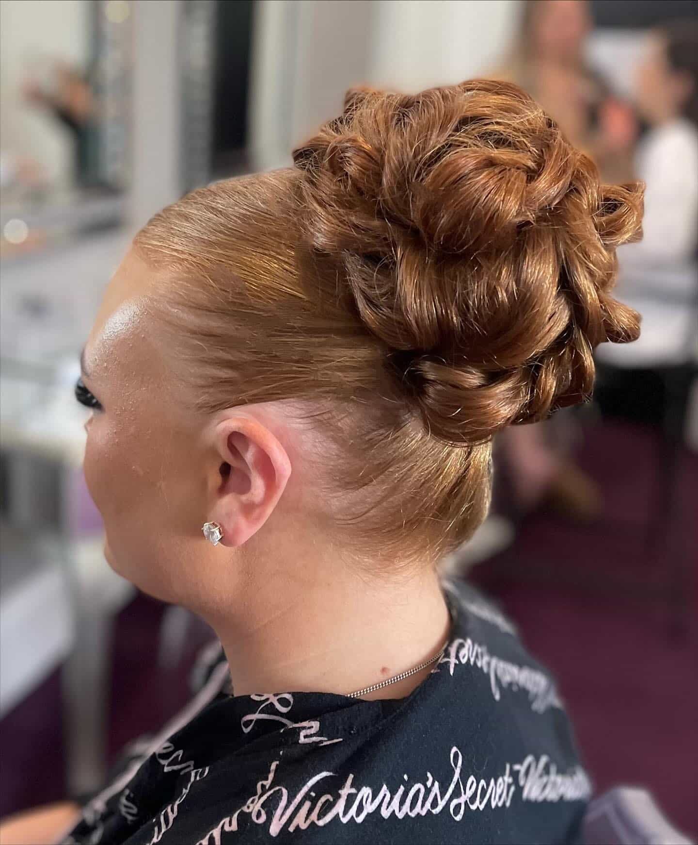 18. Textured Curled Bun in Coppery Auburn - Slick Back Hairstyles