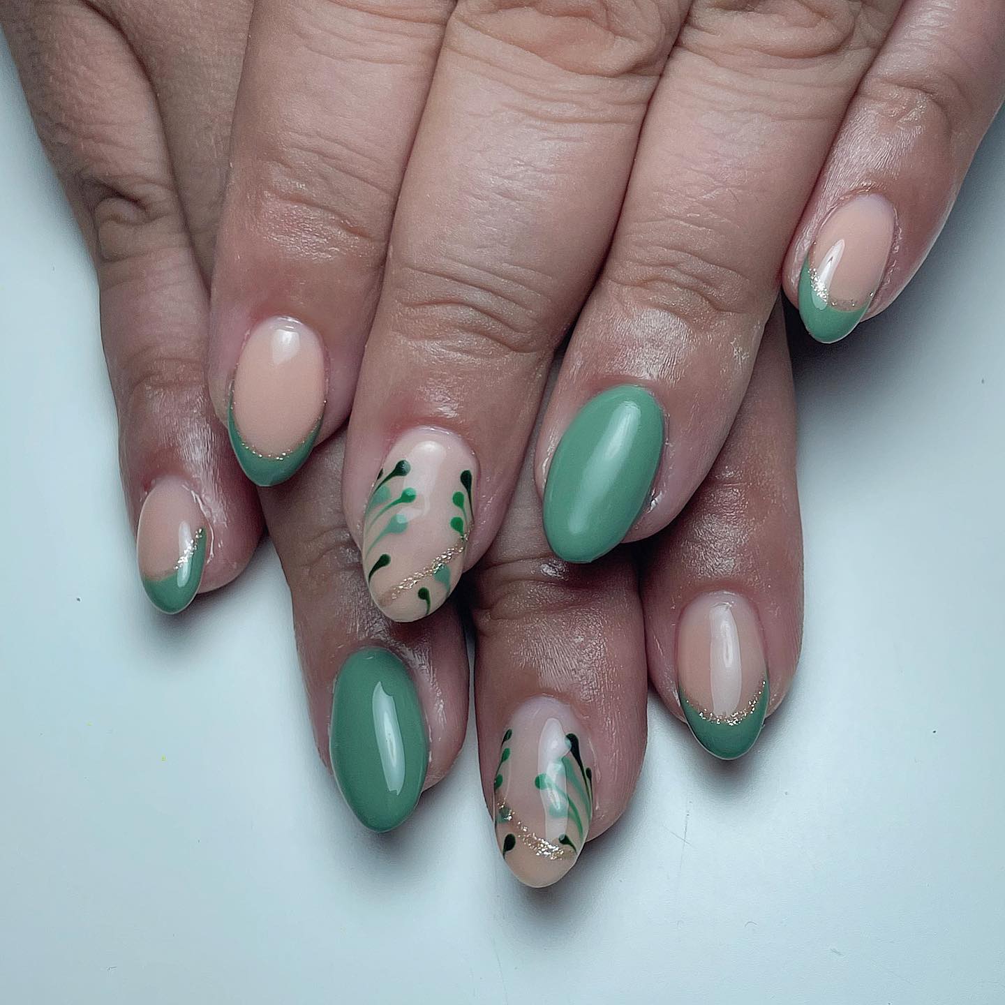 14. Sage French Tip Almond Nails with Botanical Accent Art - sage nail ideas