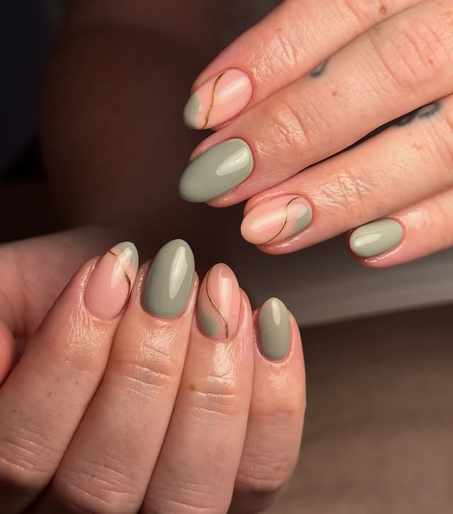21. Sage Green Almond Nails with Nude Accent and Gold Line Art - sage nail ideas