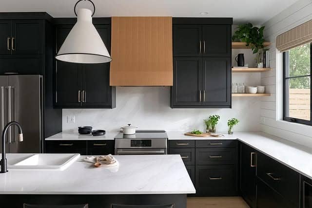 3. Modern Black Cabinet Kitchen with White Waterfall Island - white and black kitchen ideas